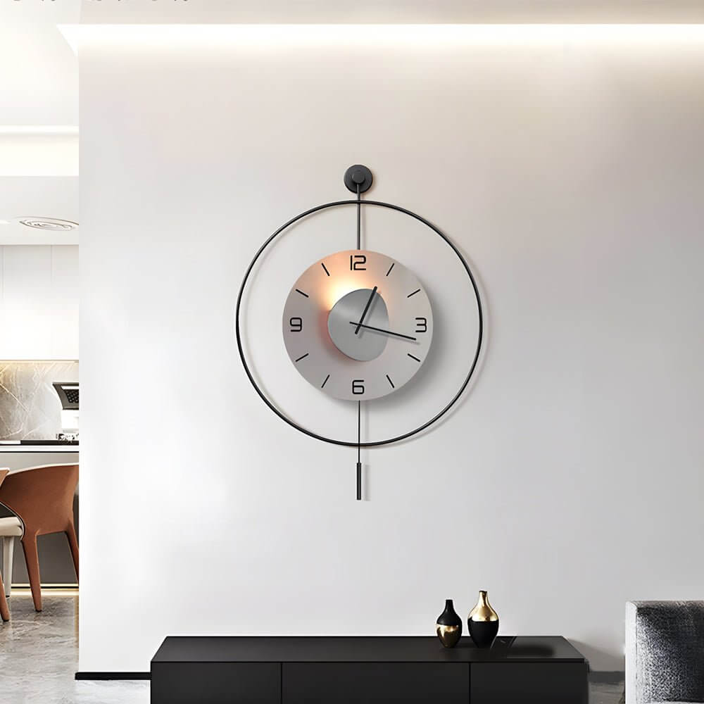 Night light wall clock with a warm glow, displayed against a neutral wall.