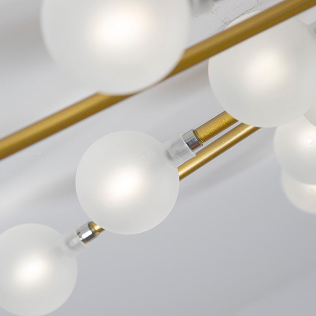 Modern sputnik ceiling light in cozy bedroom with neutral bedding and contemporary styling