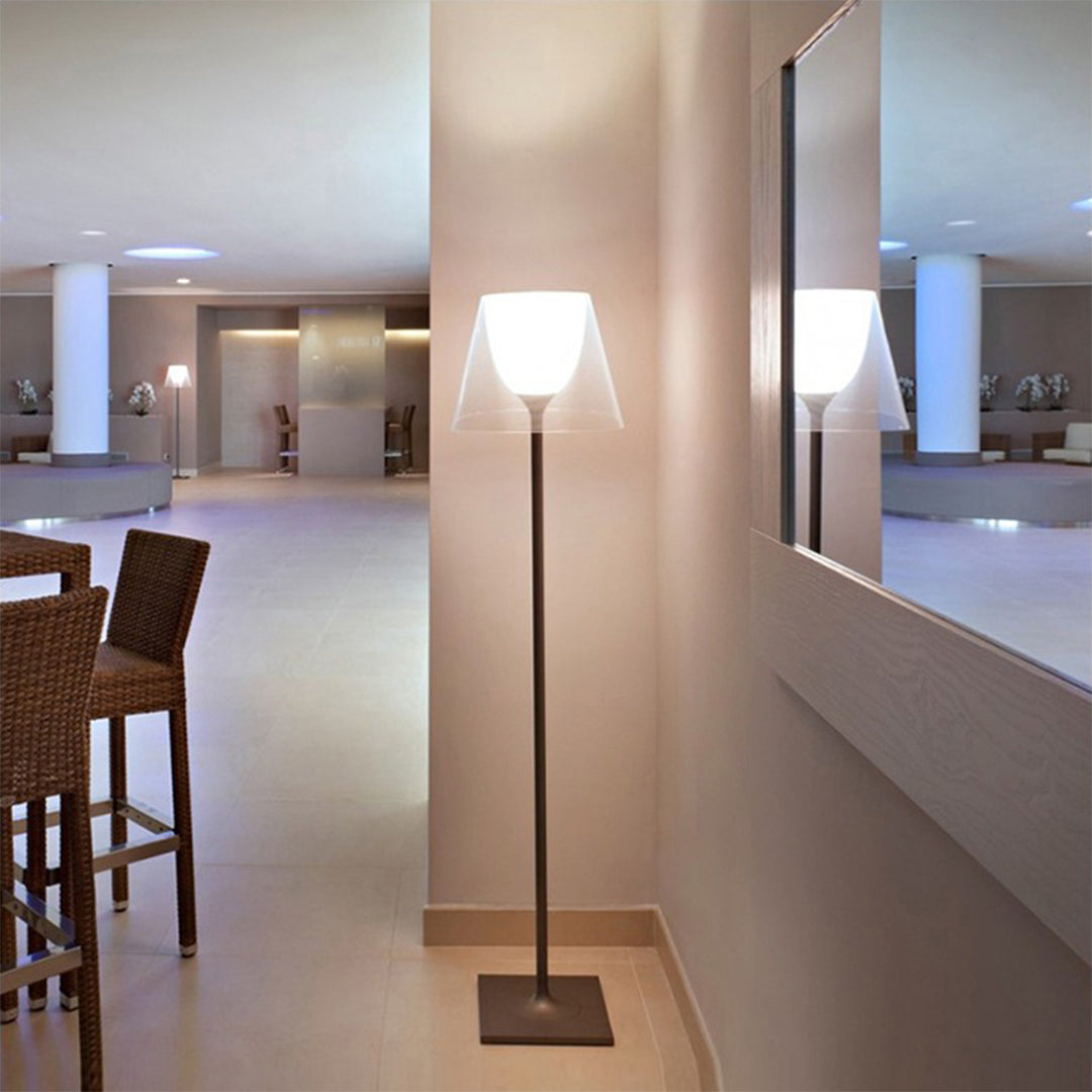 Pair of Nordic floor lamps in modern bedroom providing balanced ambient lighting and symmetry