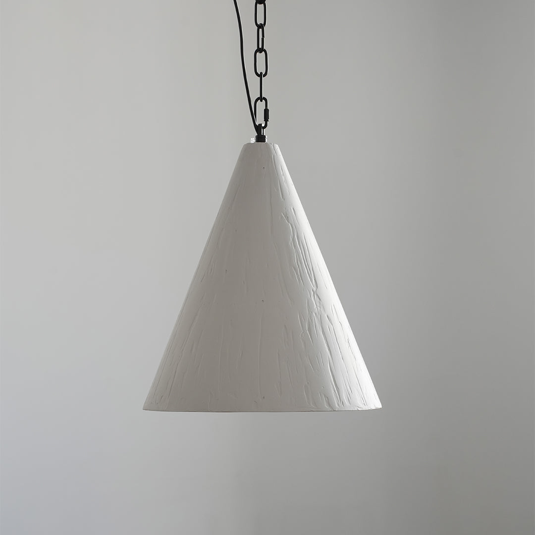 Close-up of Nordic style pendant light interior showing textured golden inner finish.