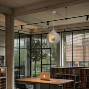 Nordic Wabi Sabi Pendant Light installed in modern office interior with natural wood décor and daylight.