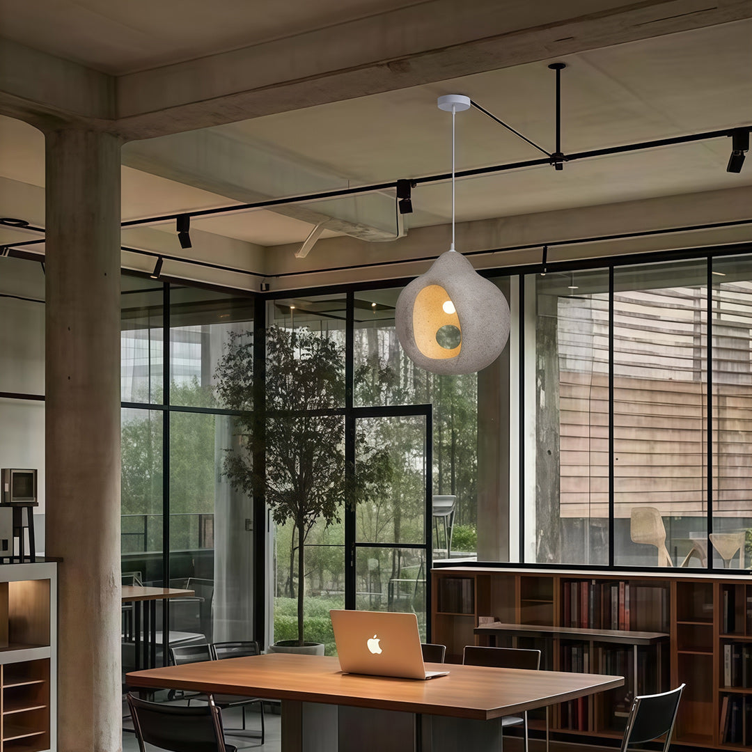Nordic Wabi Sabi Pendant Light installed in modern office interior with natural wood décor and daylight.