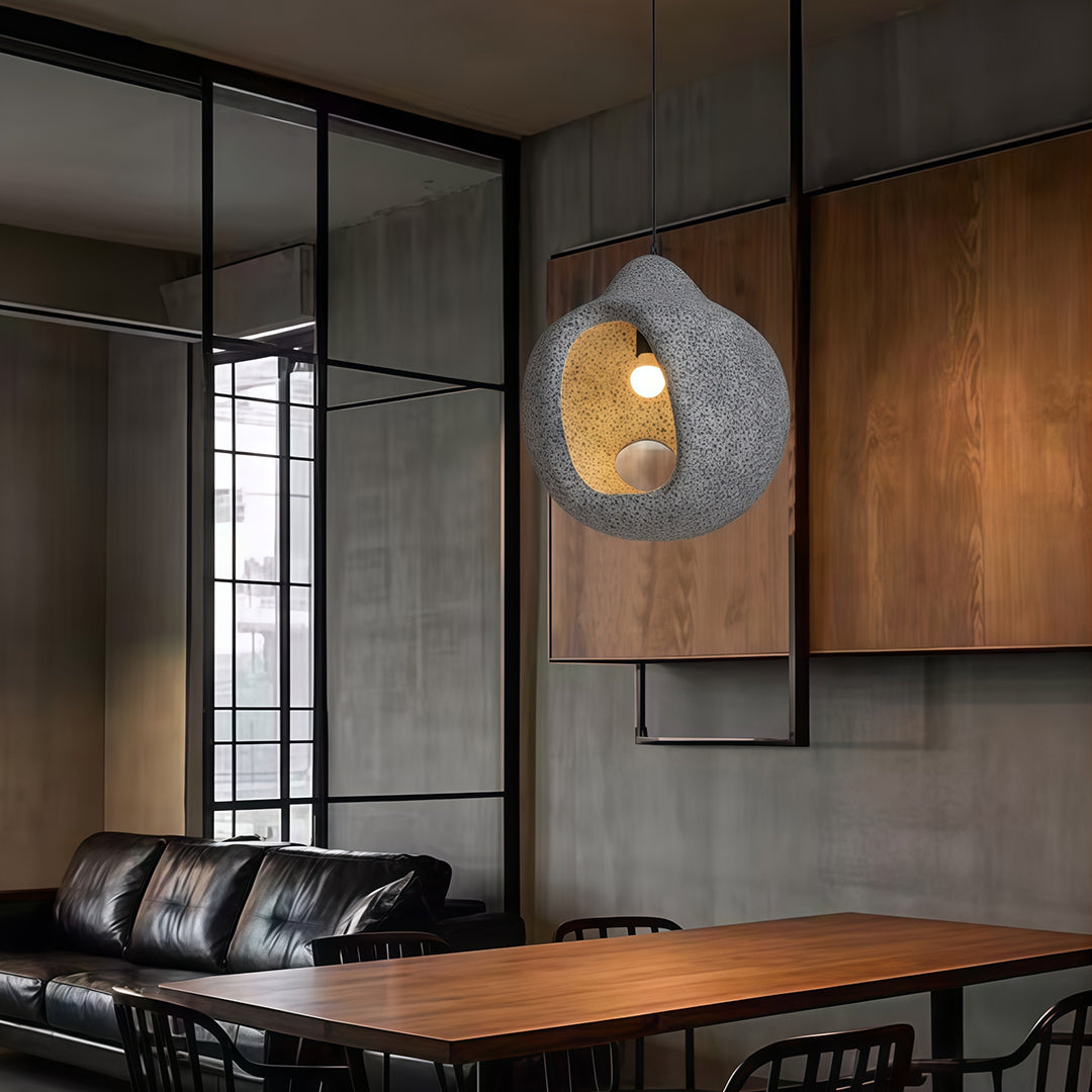 Nordic Wabi Sabi Pendant Lights above wooden dining table in cozy minimalist home interior.