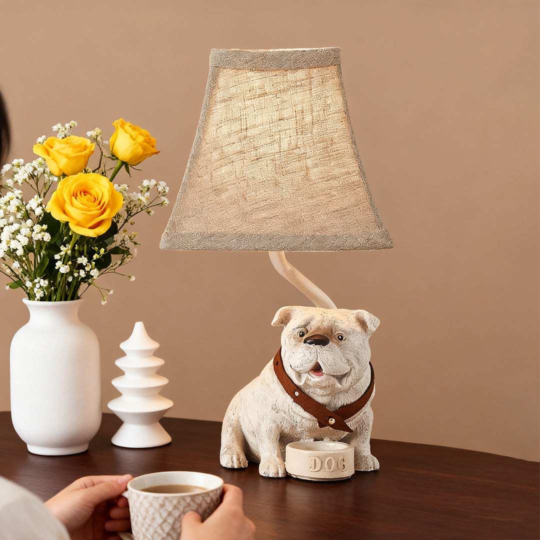 Novelty dog table lamps with a detailed bulldog figurine base, featuring a neutral textured shade and a decorative collar.