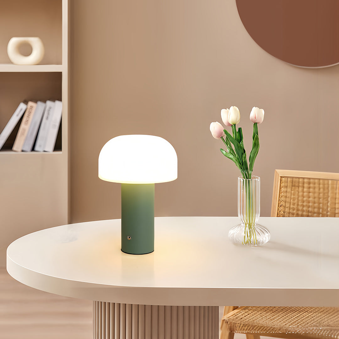 Novelty table lamps on round white dining table complementing Scandinavian interior with shelving