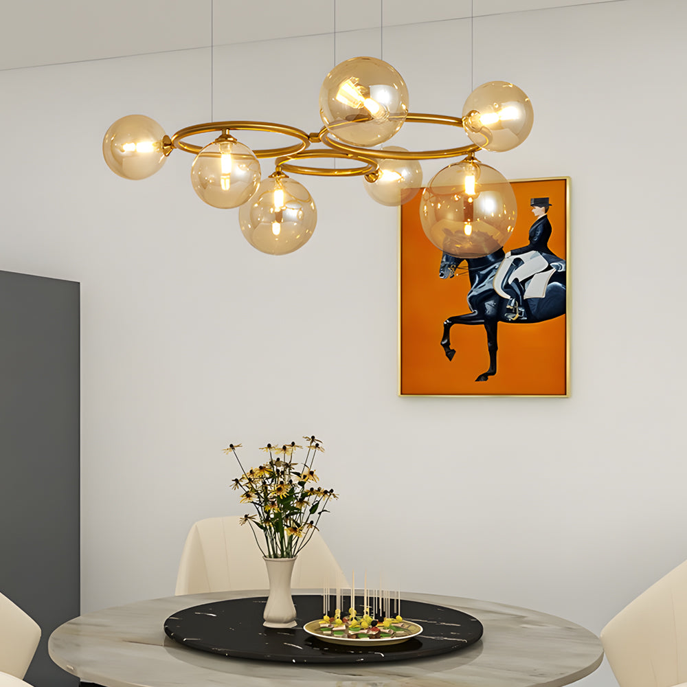 Opal glass globe chandelier with a black frame, enhancing a cozy bedroom ambiance.