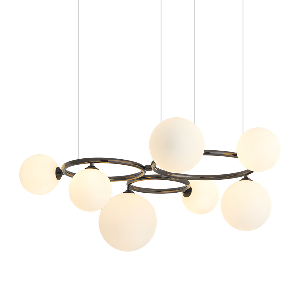 Opal glass globe chandelier with a copper frame, providing soft illumination in a living room.