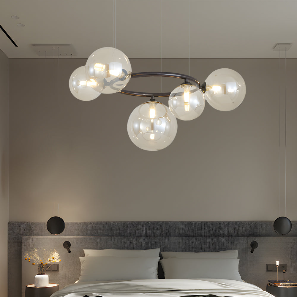 Opal glass globe chandelier with a copper frame, providing soft illumination in a living room.