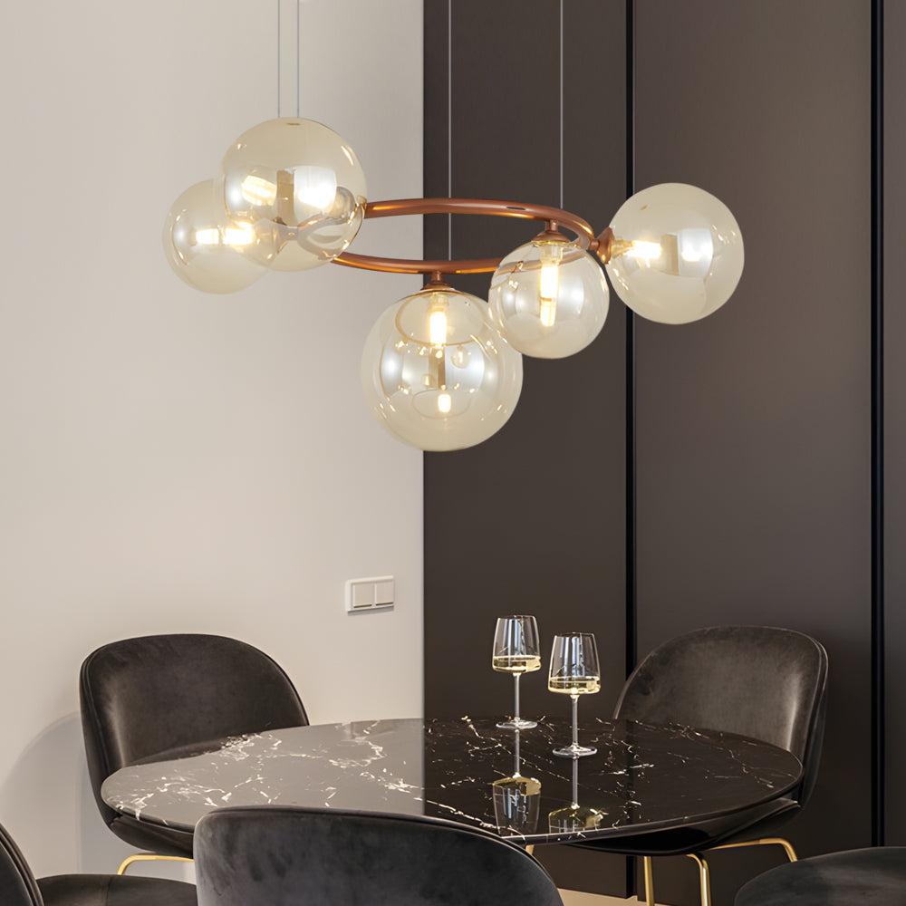 Opal glass globe chandelier with a modern design, hanging above a stylish dining table.