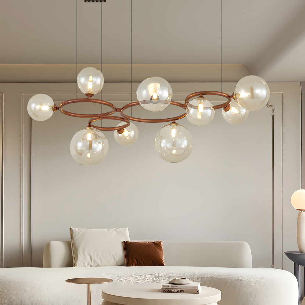 Opal glass globe chandelier with a sleek design, hanging above a stylish dining area.