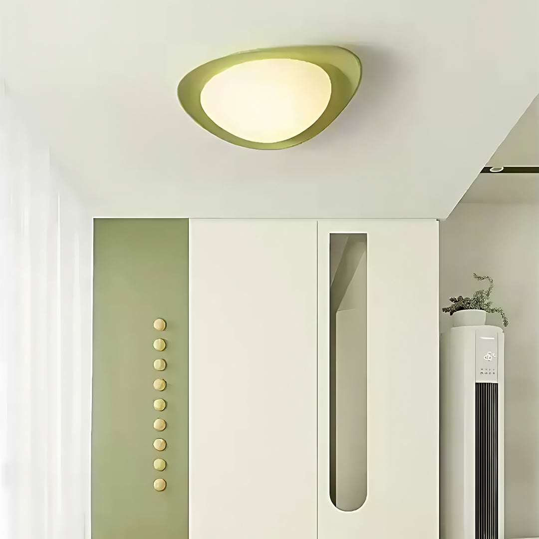Organic pebble ceiling light mounted in stylish hallway with modern architectural elements