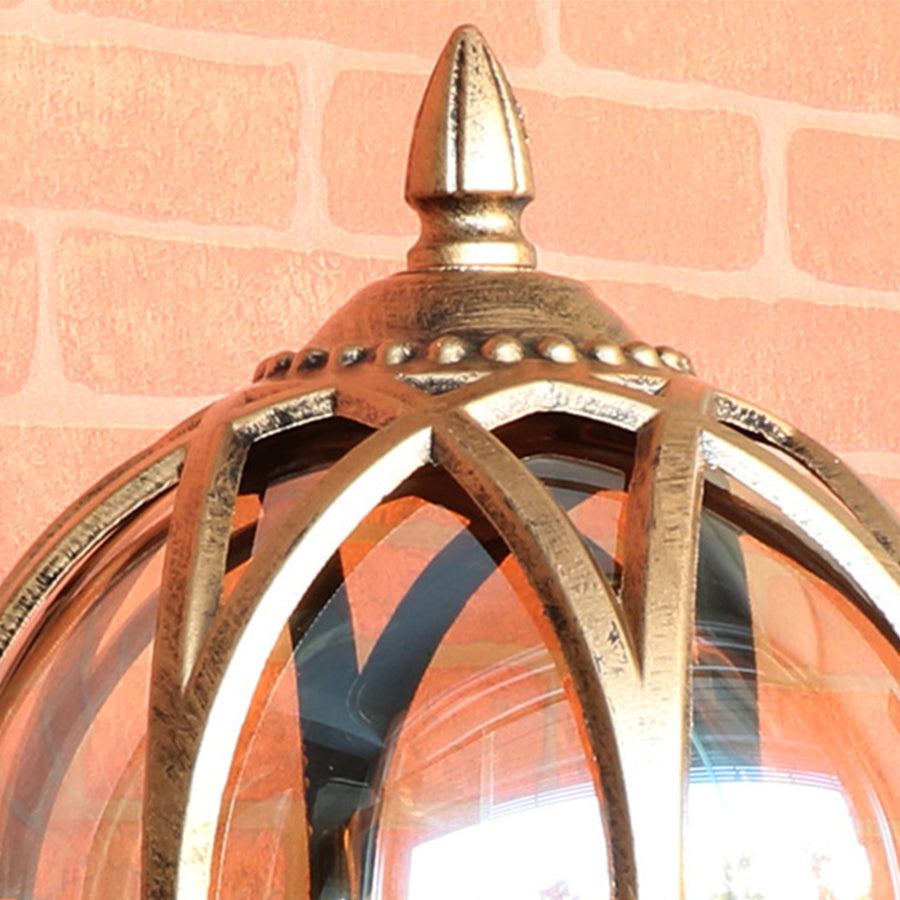 Close-up detail of ornate brass lantern showing decorative metalwork and craftsmanship