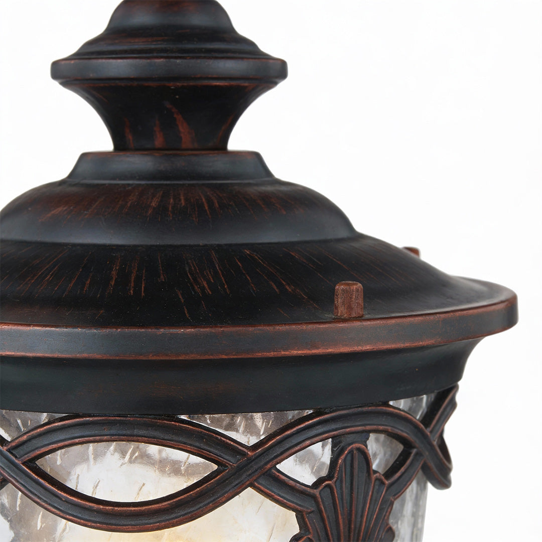 Ornate gate pillar light featuring detailed bronze top cap and sturdy design, ideal for elegant outdoor fence posts.