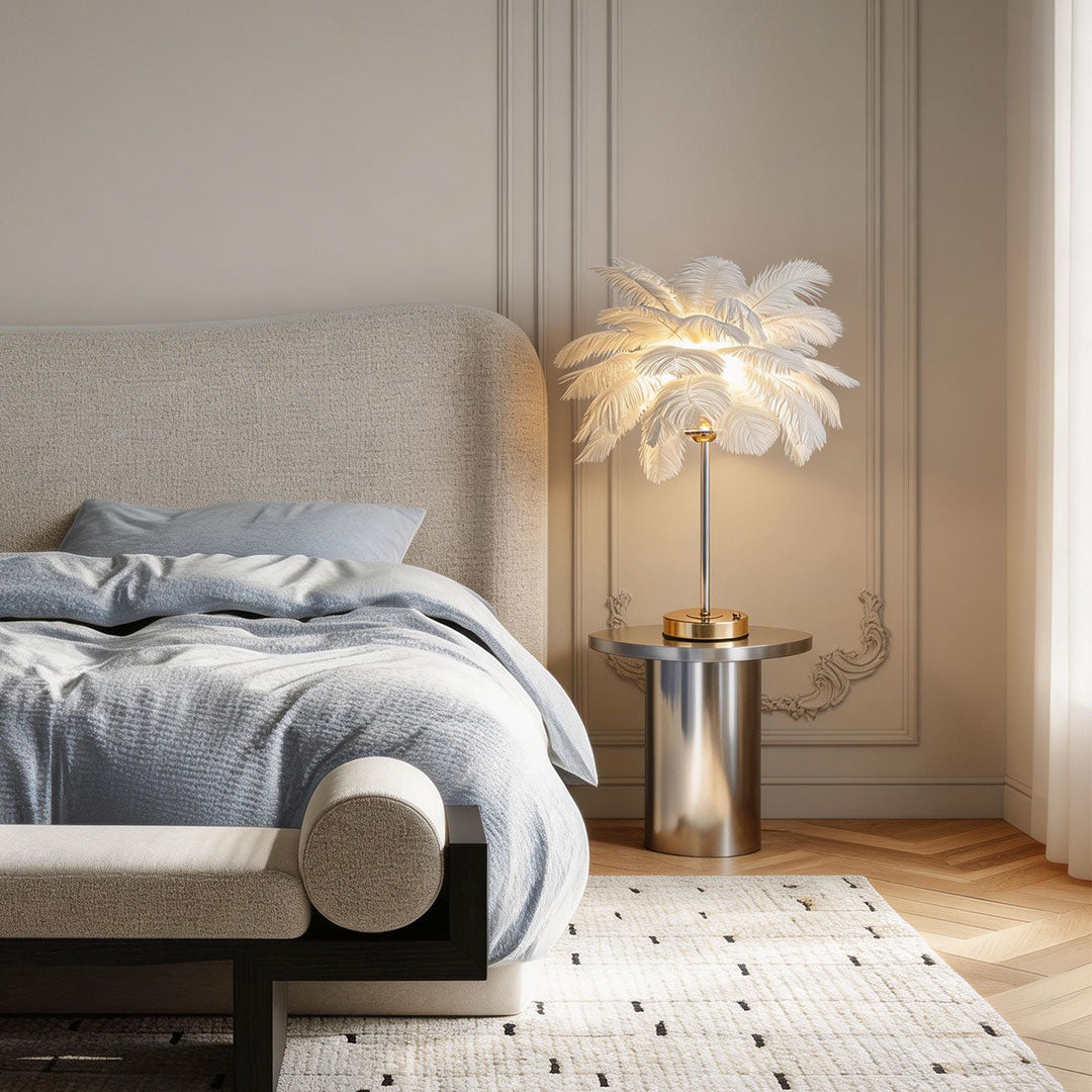 Ostrich feather table lamp with a white feather design, enhancing a modern bedroom interior.