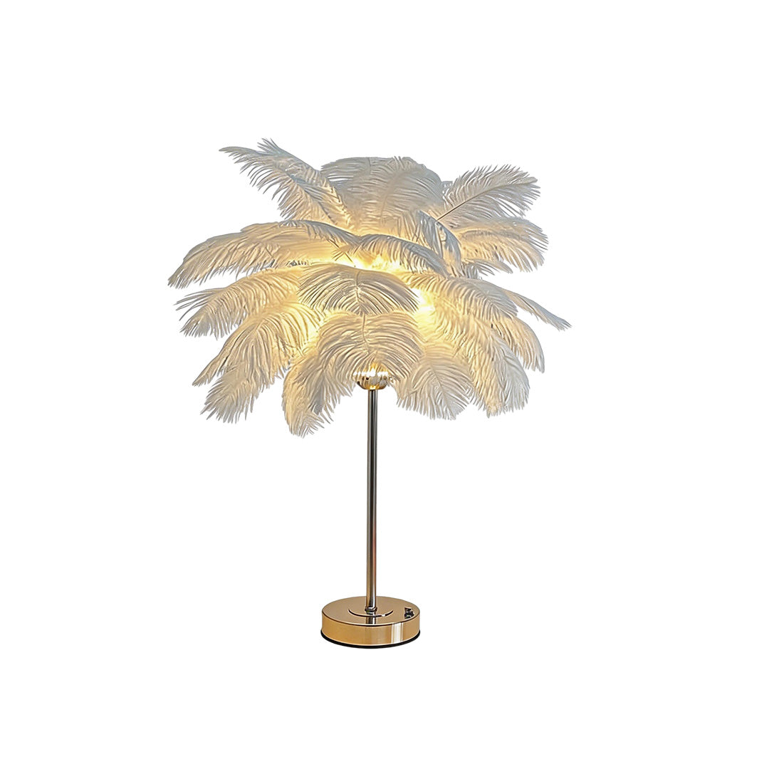 Ostrich feather table lamp with a white feather design, placed on a wooden floor.