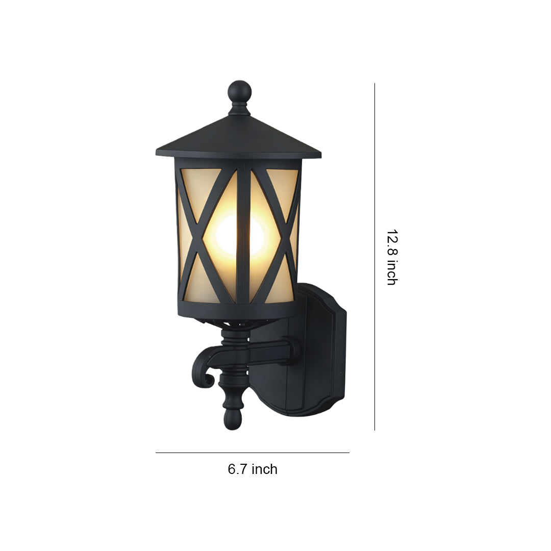 Outdoor black wall light with X-pattern glass lantern and decorative scrolled mounting bracket, shown with dimensions