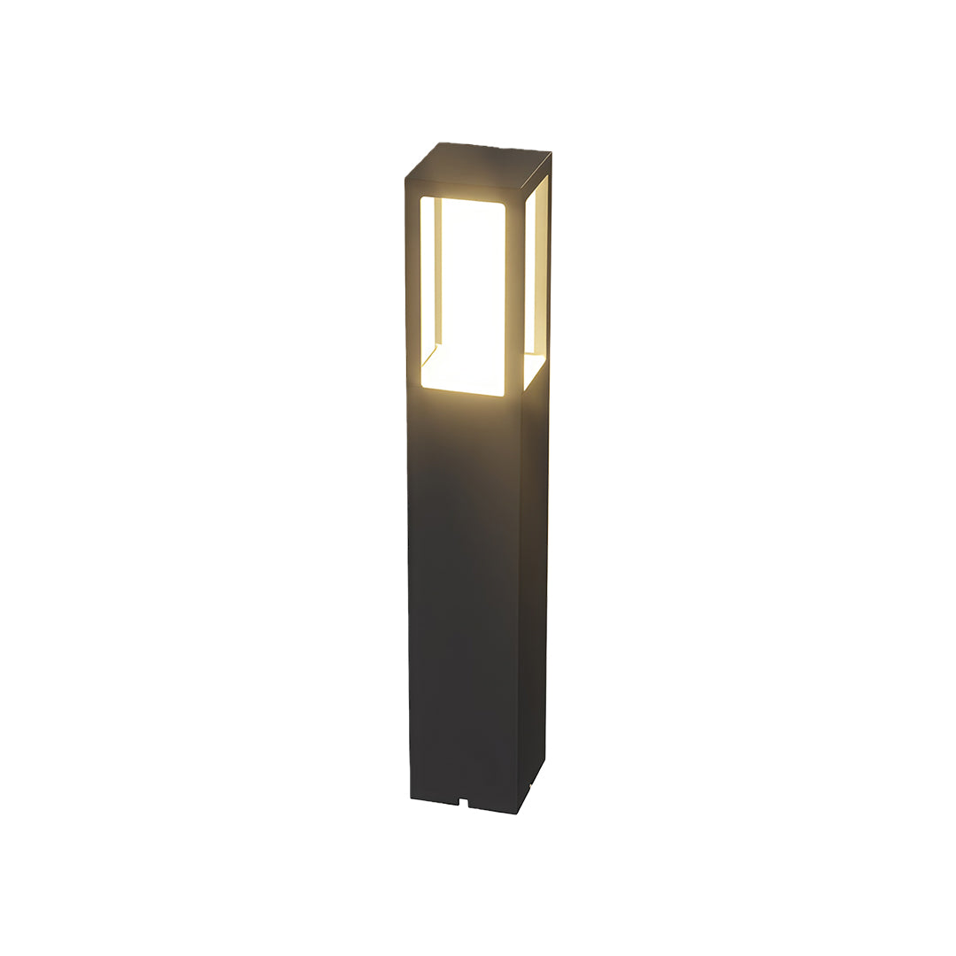Outdoor bollard light featuring a minimalist black rectangular design and a soft light glow.