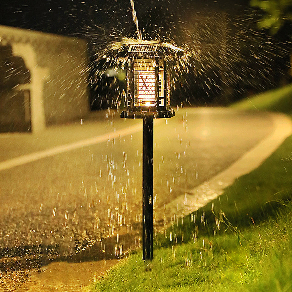 Outdoor bug repellent lights with a black finish, providing soft light in a backyard.
