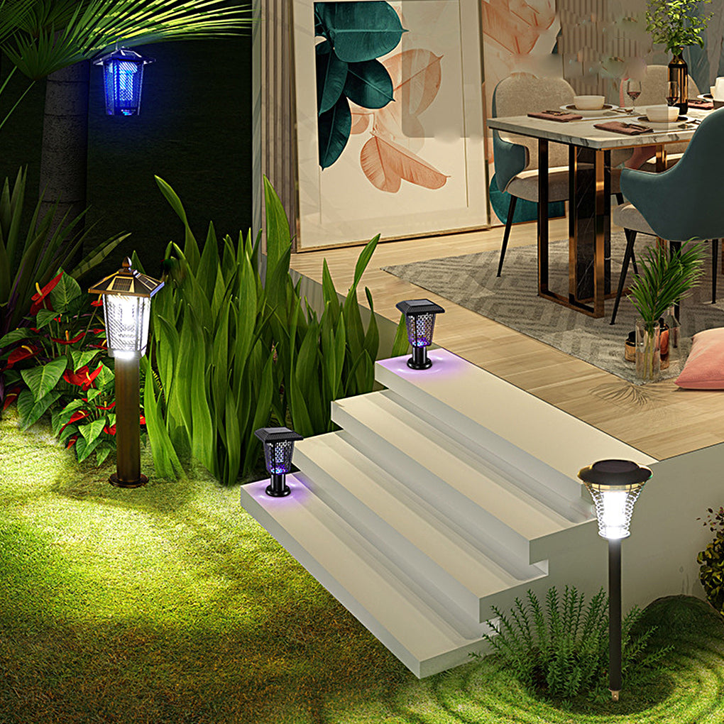 Outdoor bug repellent lights with a solar panel, mounted on a garden fence.