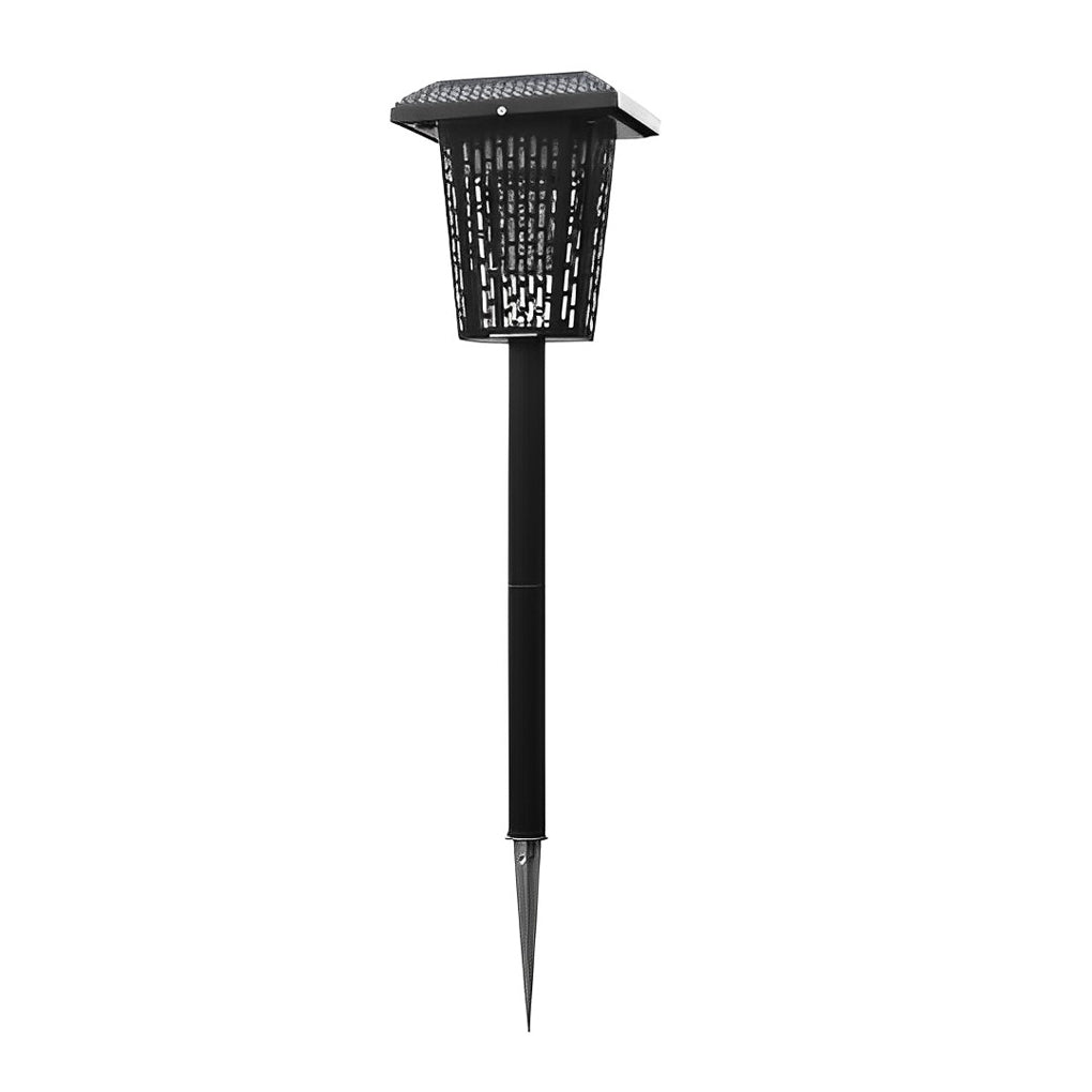 Outdoor bug repellent lights with a solar panel, providing illumination near a garden.