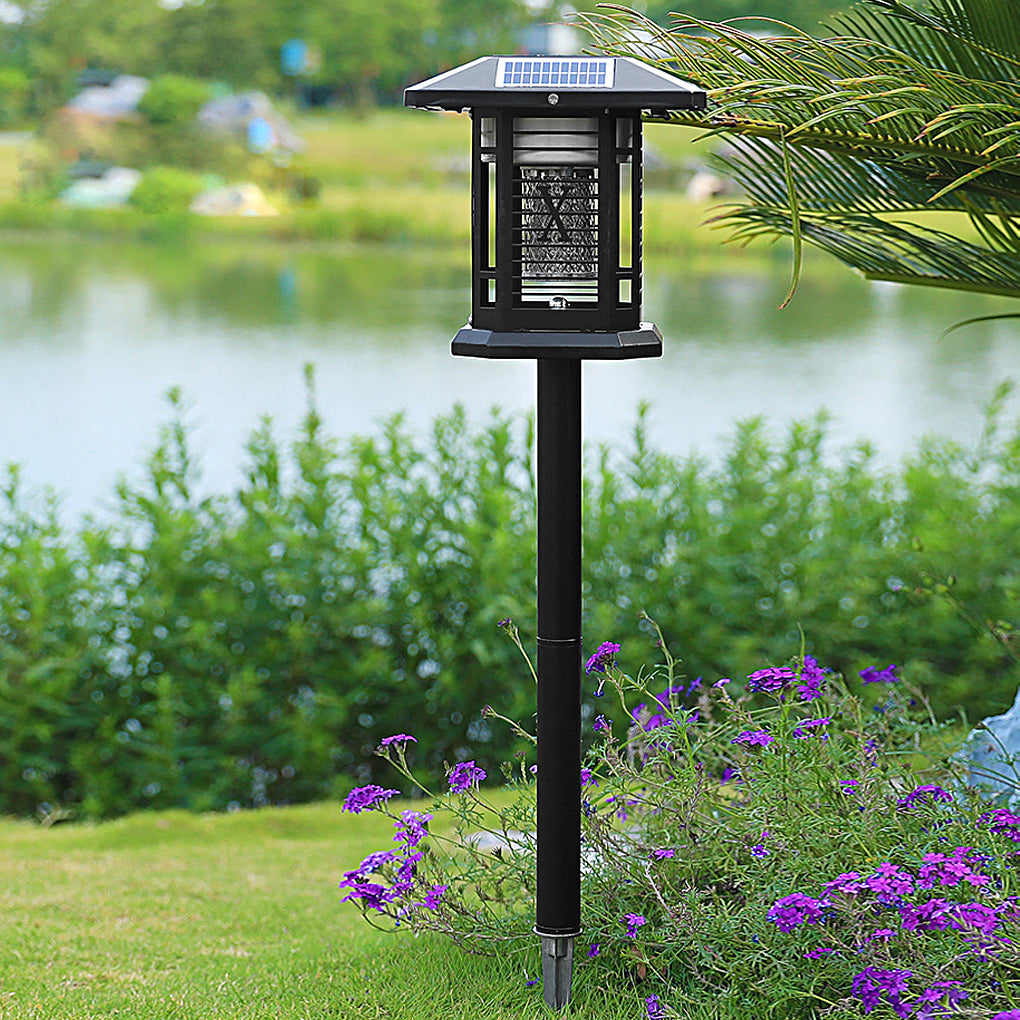 Outdoor bug repellent lights providing warm illumination near a garden bench.