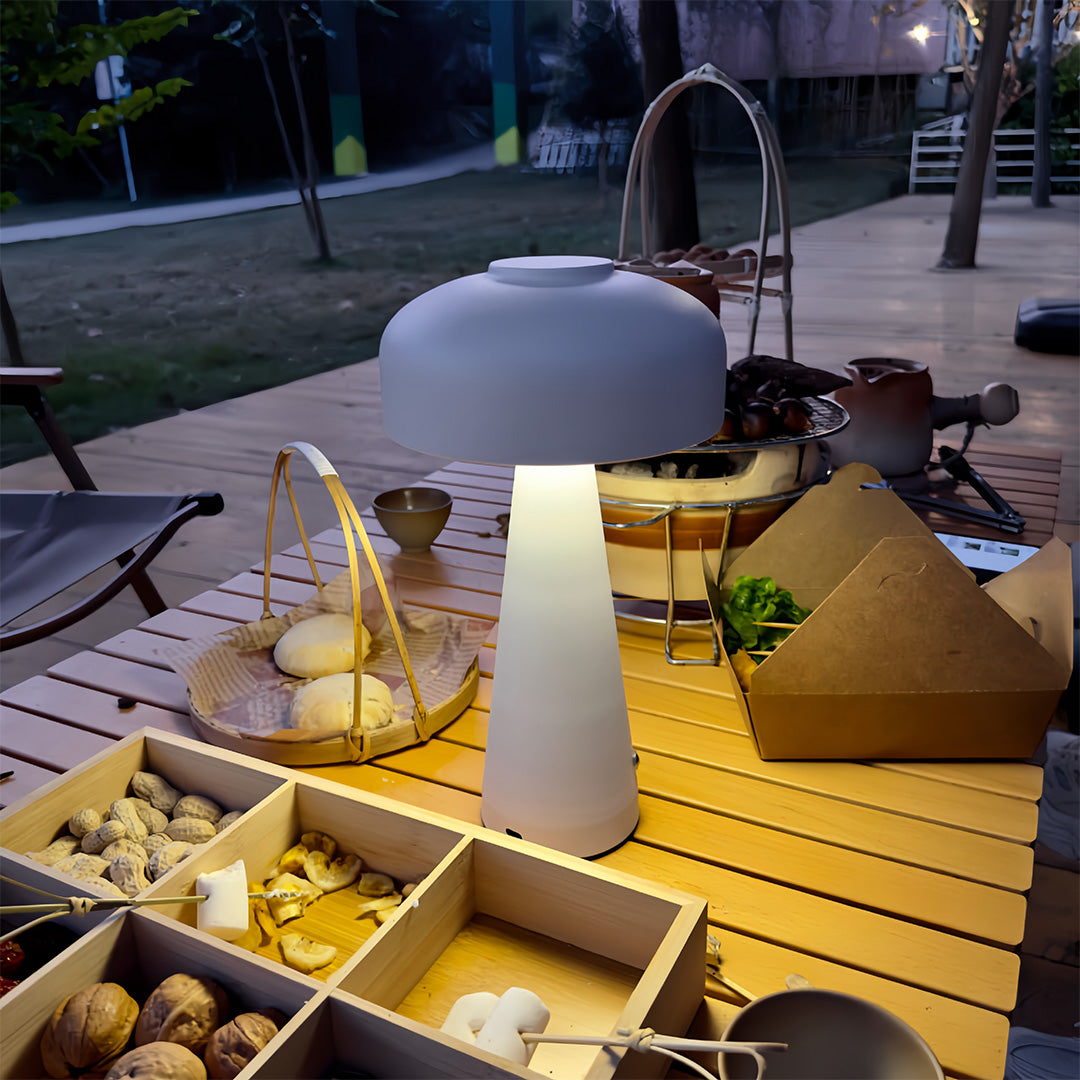 Outdoor dining setup with small black pendant light creating cozy mushroom table lamp atmosphere