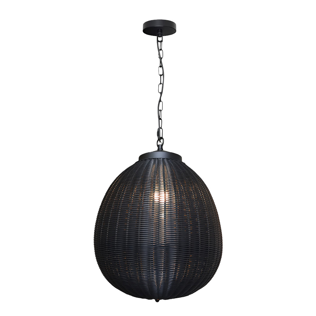 Outdoor dining area with black woven pendant lights providing a cozy and decorative touch to the patio.