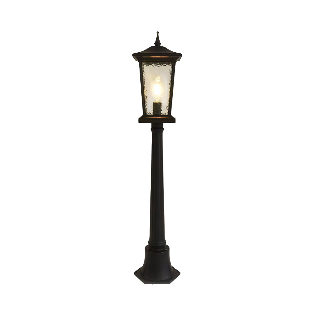Outdoor driveway pillar lights with a black finish, enhancing a modern exterior.