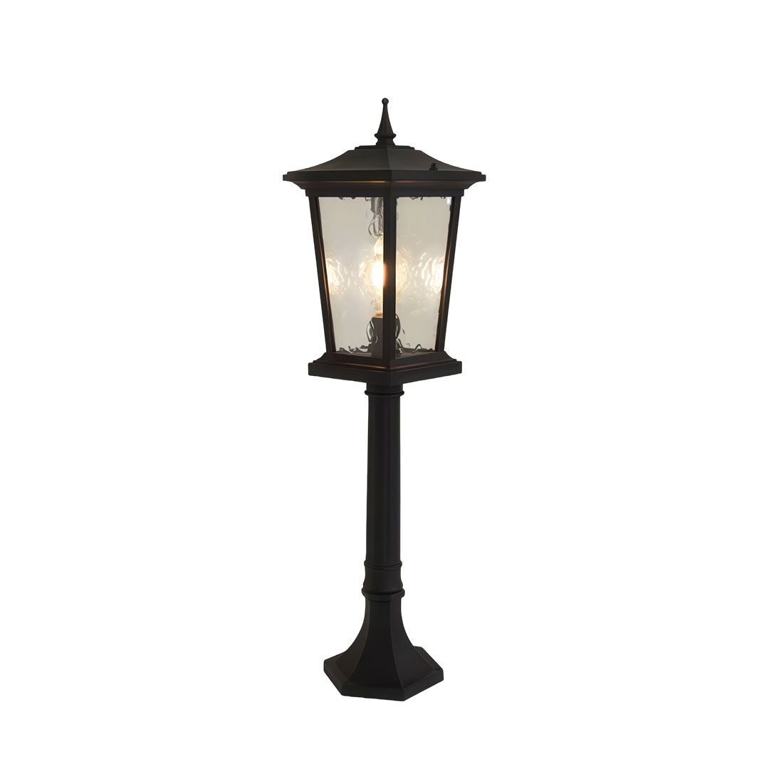 Outdoor driveway pillar lights with a classic design, providing ambient lighting.