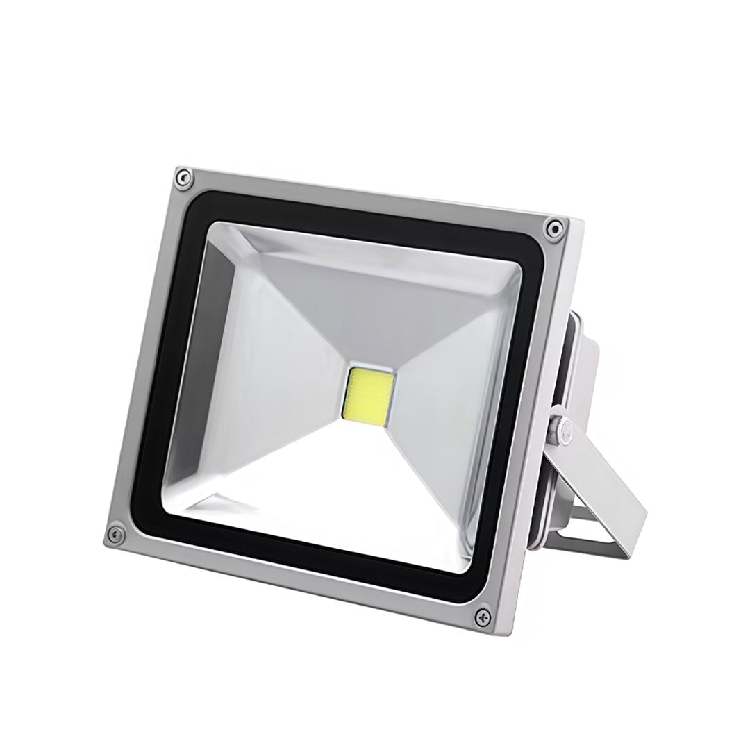 Outdoor flood lights LED with a black finish, illuminating a garden.