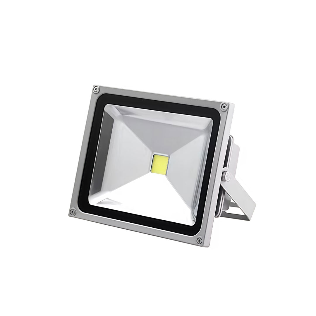 Outdoor flood lights LED with a modern design, illuminating a backyard.