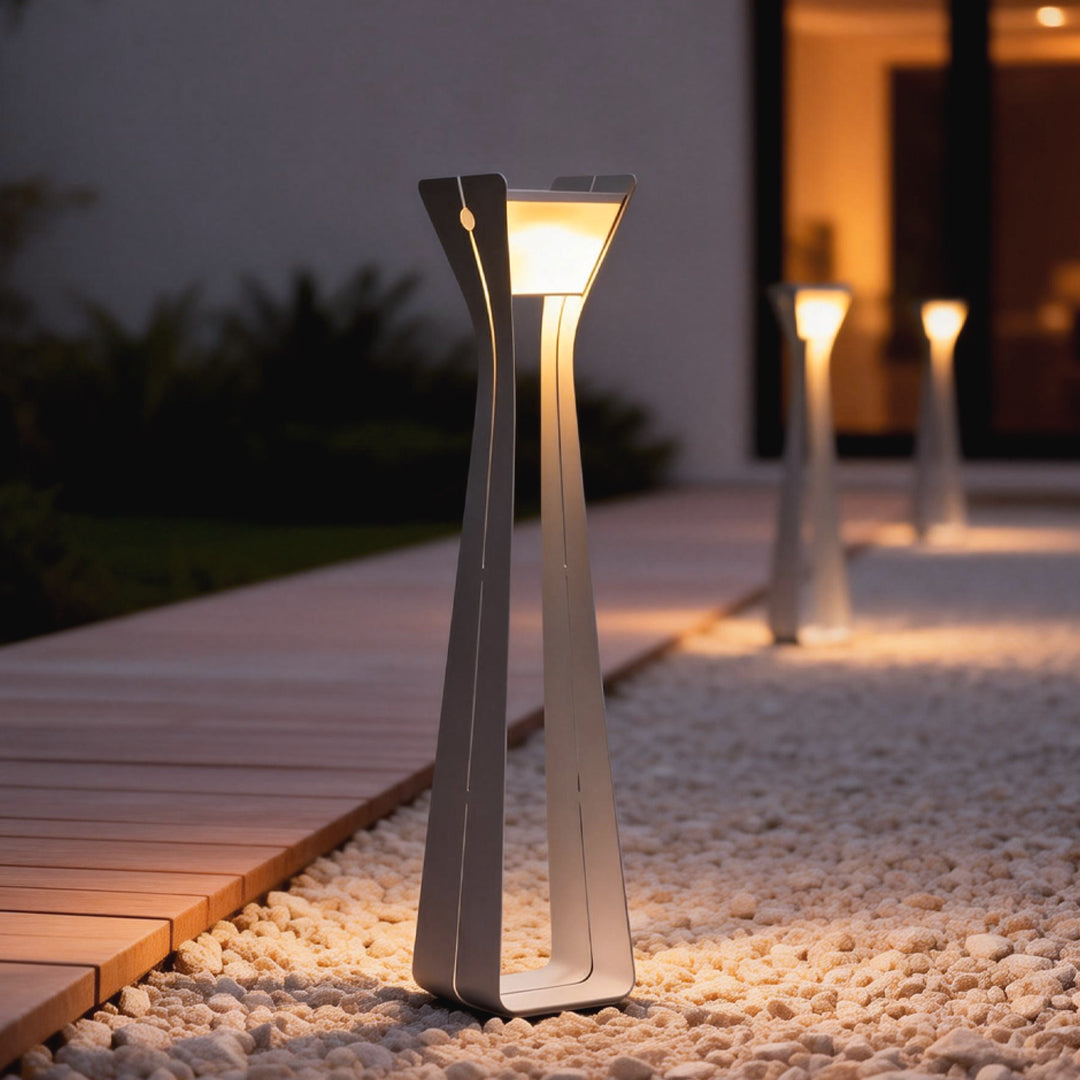 Modern outdoor floor lamps for porches lining a wooden walkway, providing warm ambient lighting for evening outdoor spaces.