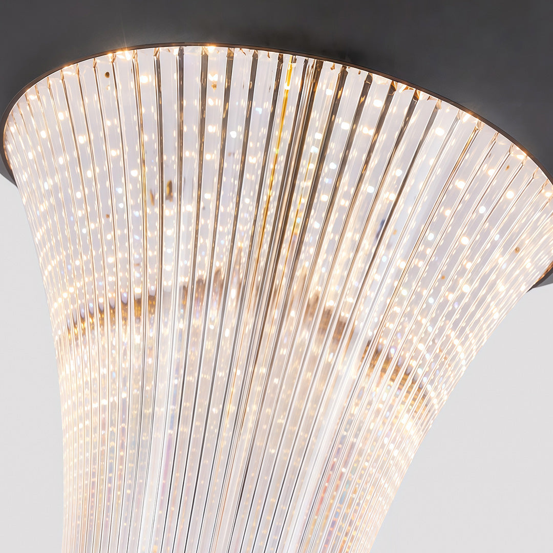 Outdoor garden light pillar providing bright illumination near a garden fence.