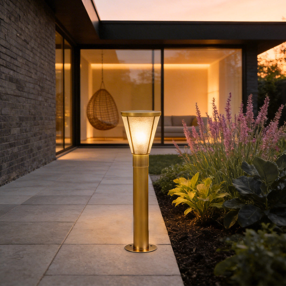 Outdoor garden path lights with a contemporary design, enhancing a modern house entrance.