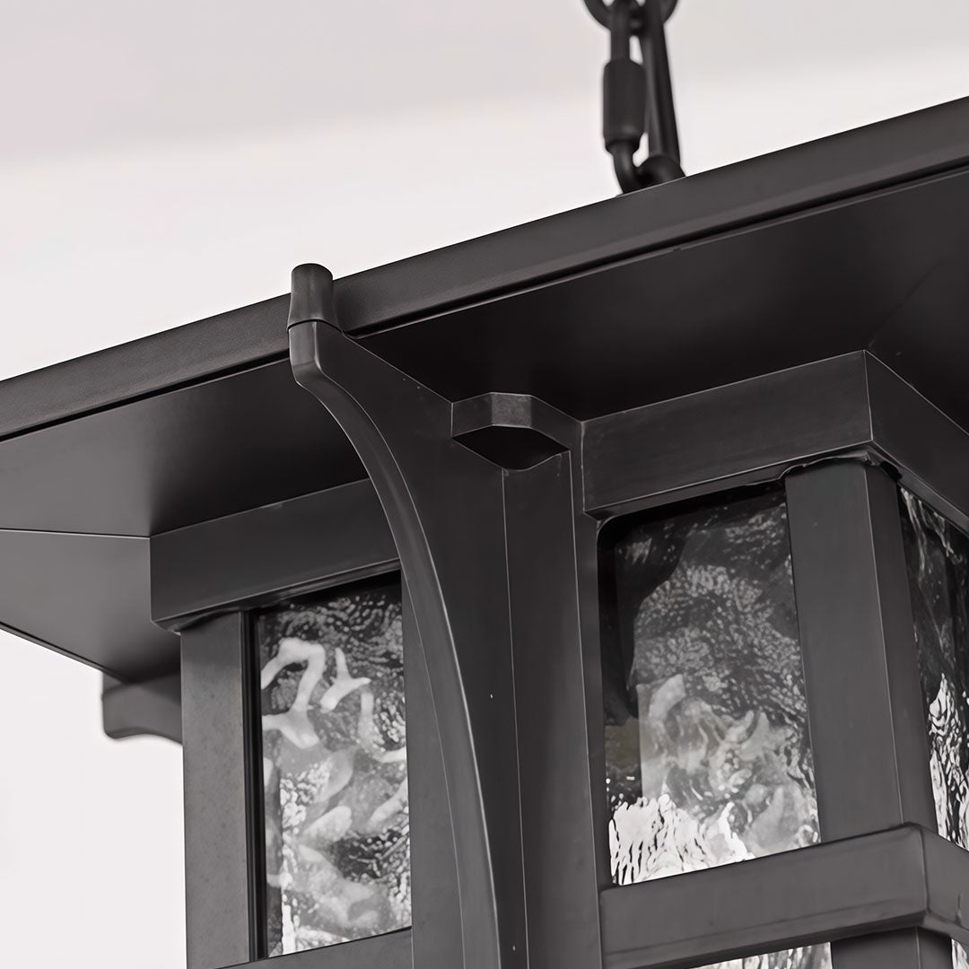Outdoor hanging ceiling light fixtures with a classic design, suspended by a chain.