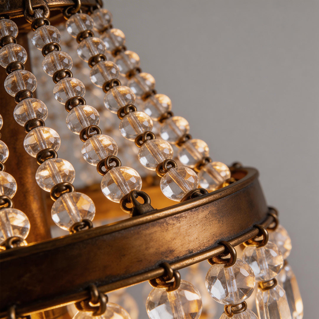 Outdoor hanging lantern light fixtures with a crystal design, providing ambient lighting.