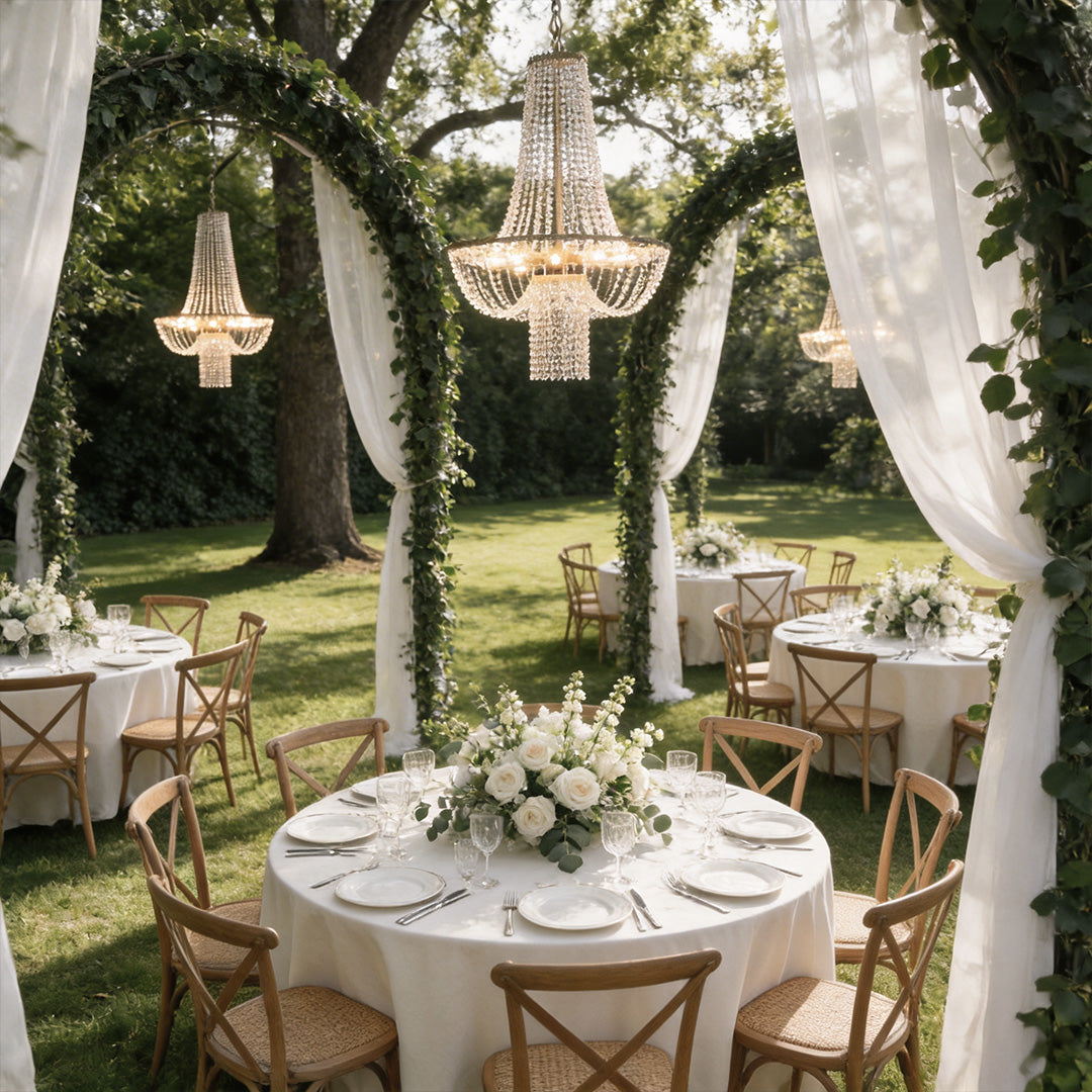 Outdoor hanging light fixture with a vintage design, illuminating a decorated dining table.