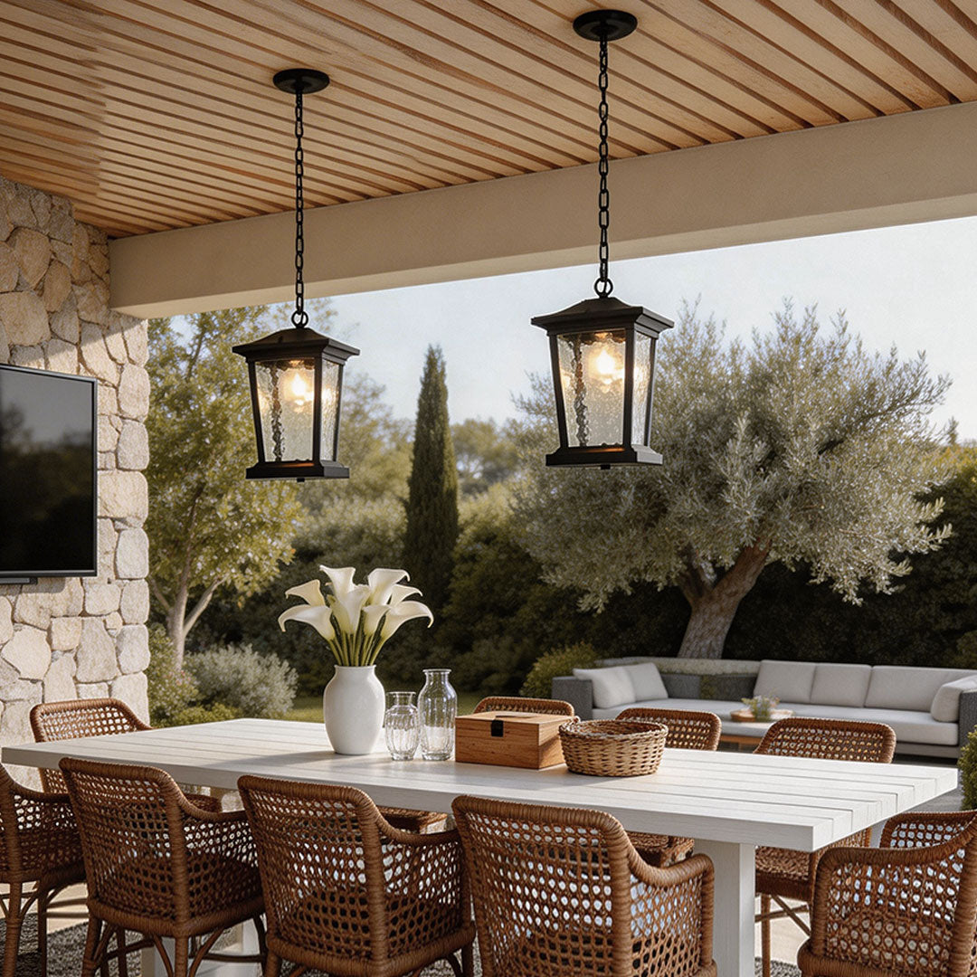Outdoor hanging lights for porch with a classic design, illuminating a cozy dining area.
