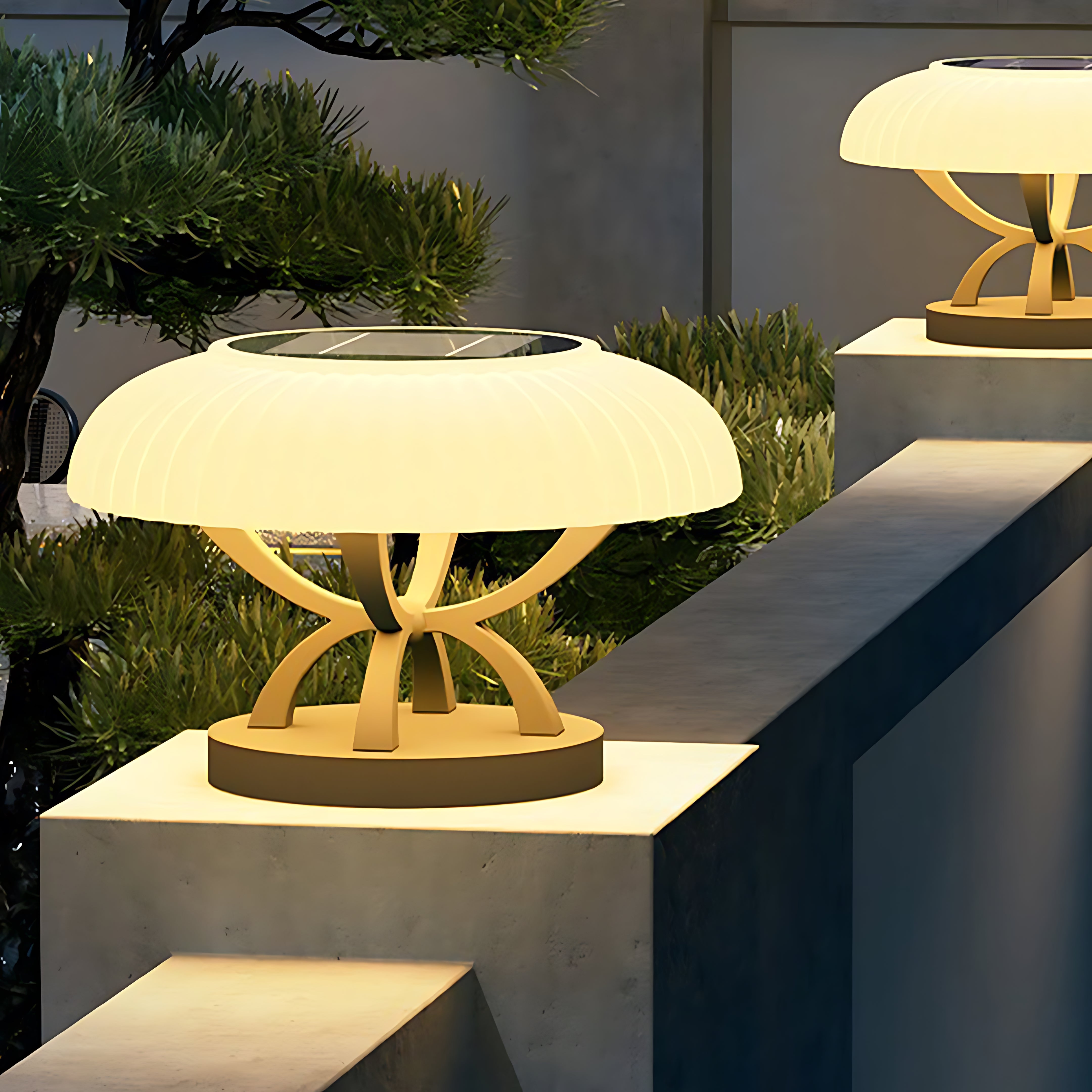 Outdoor installation of hollow square pillar light with warm LED canopy creating inviting illumination on concrete base