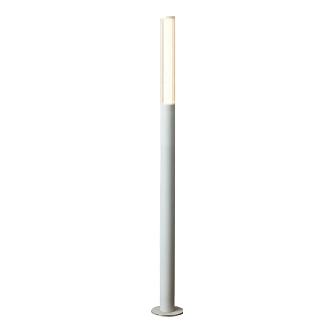 Silver led bollard garden light installed outdoors, illuminating surrounding plants in a landscaped walkway.