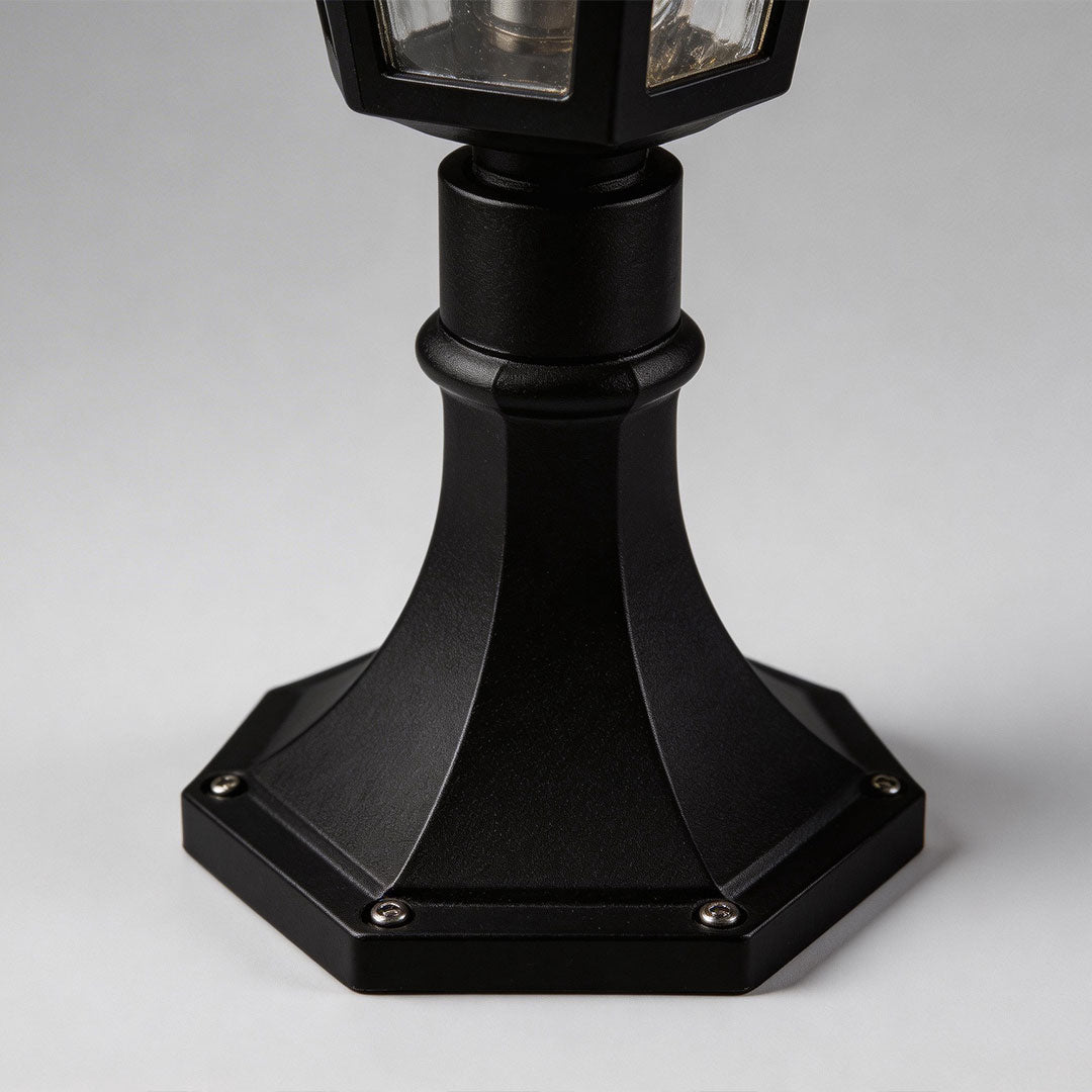 Outdoor landscape path lighting with a black finish, providing soft illumination.