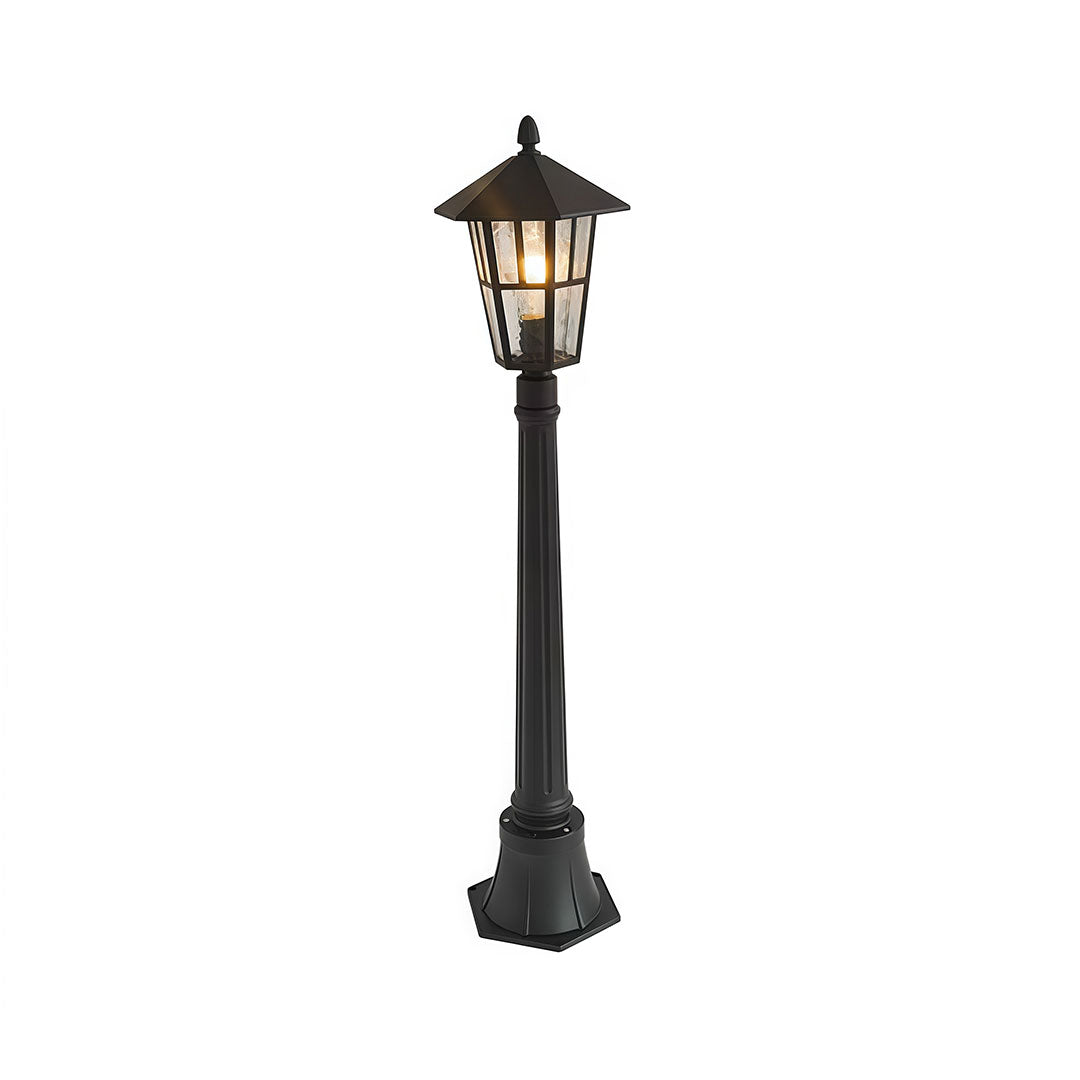 Outdoor landscape path lighting with a classic design, providing ambient light.