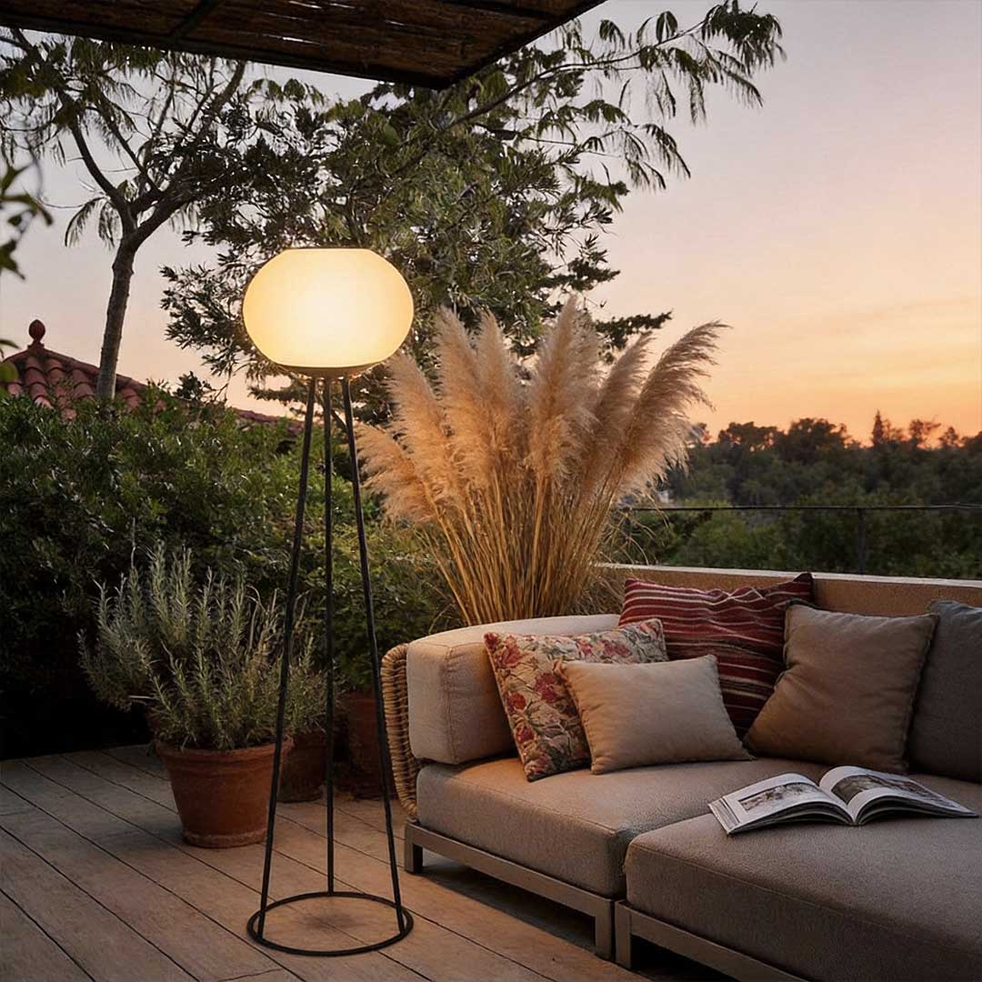 Modern outdoor LED floor light with a sleek black frame and soft, diffused white light, adding style to garden and patio areas.