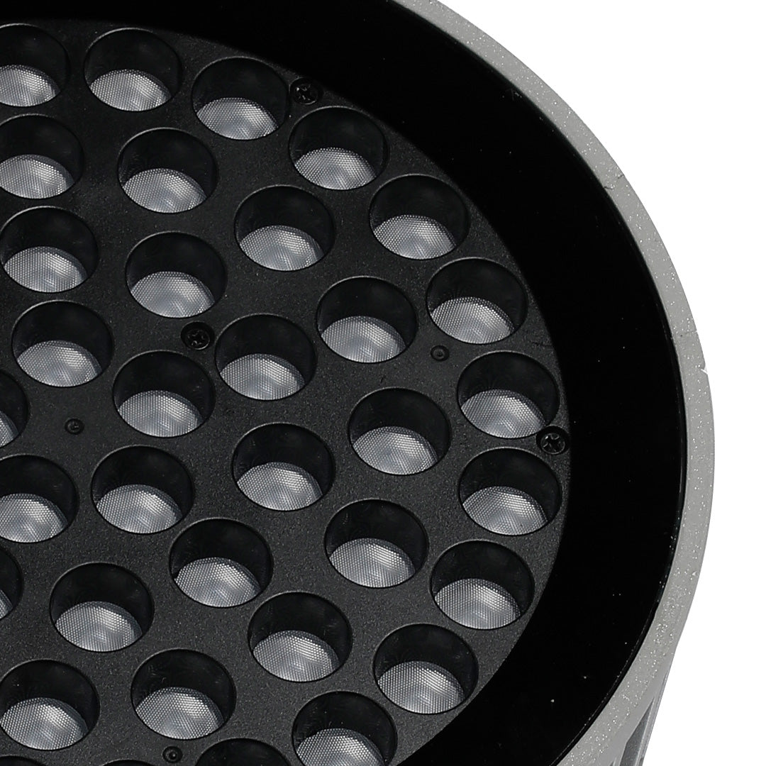 Outdoor LED garden spotlights creating elegant uplighting for Mediterranean style home entrance