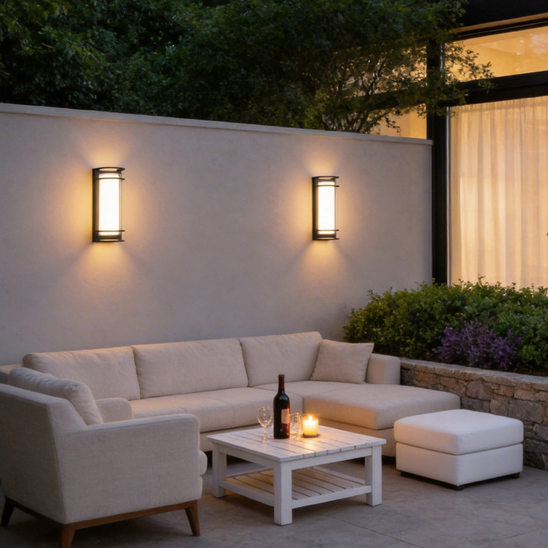 Outdoor LED light fixtures wall mount enhancing a modern outdoor seating area with ambient light.