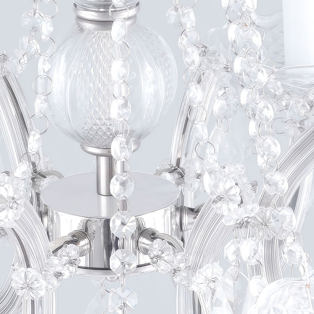Outdoor lighting hanging with crystal details, enhancing a garden archway.