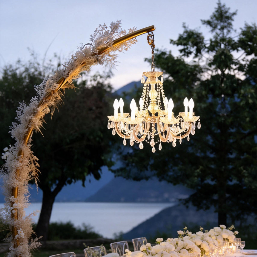 Outdoor lighting hanging with a vintage design, illuminating a decorated dining table.