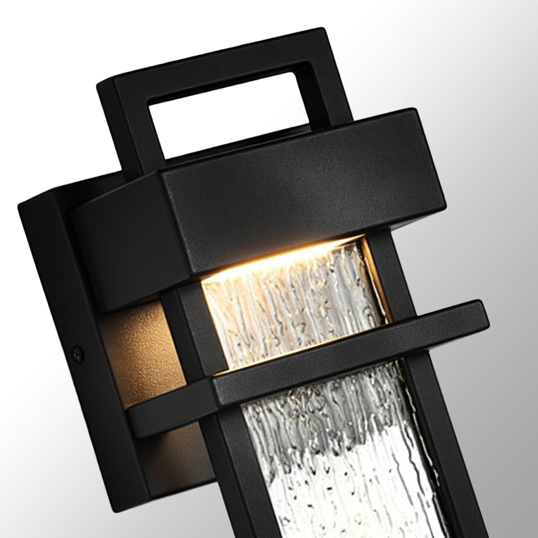 modern black outdoor lighting wall mount featuring geometric housing and water-patterned glass