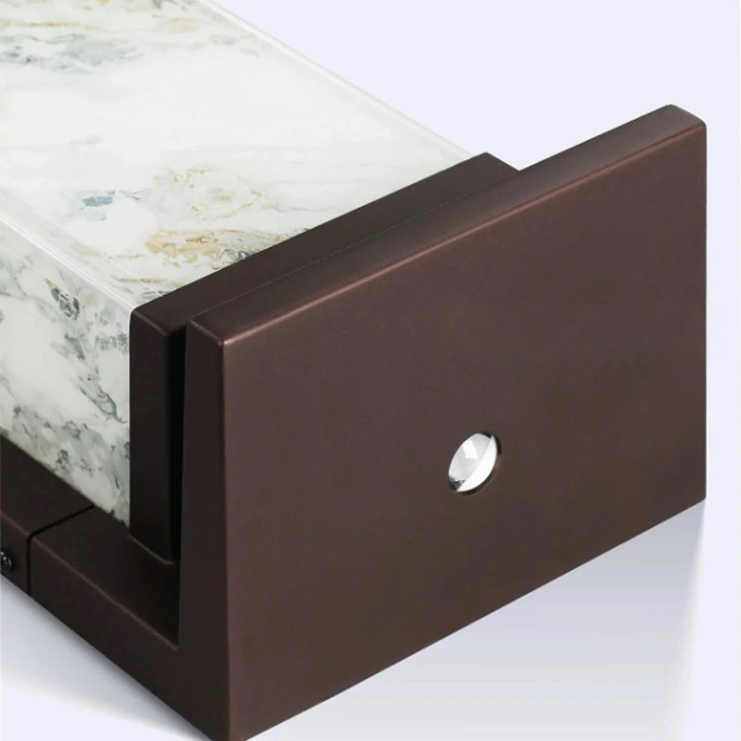 Outdoor lights wall mount with a rectangular dark brown metal housing shown installed beside a stone surface.