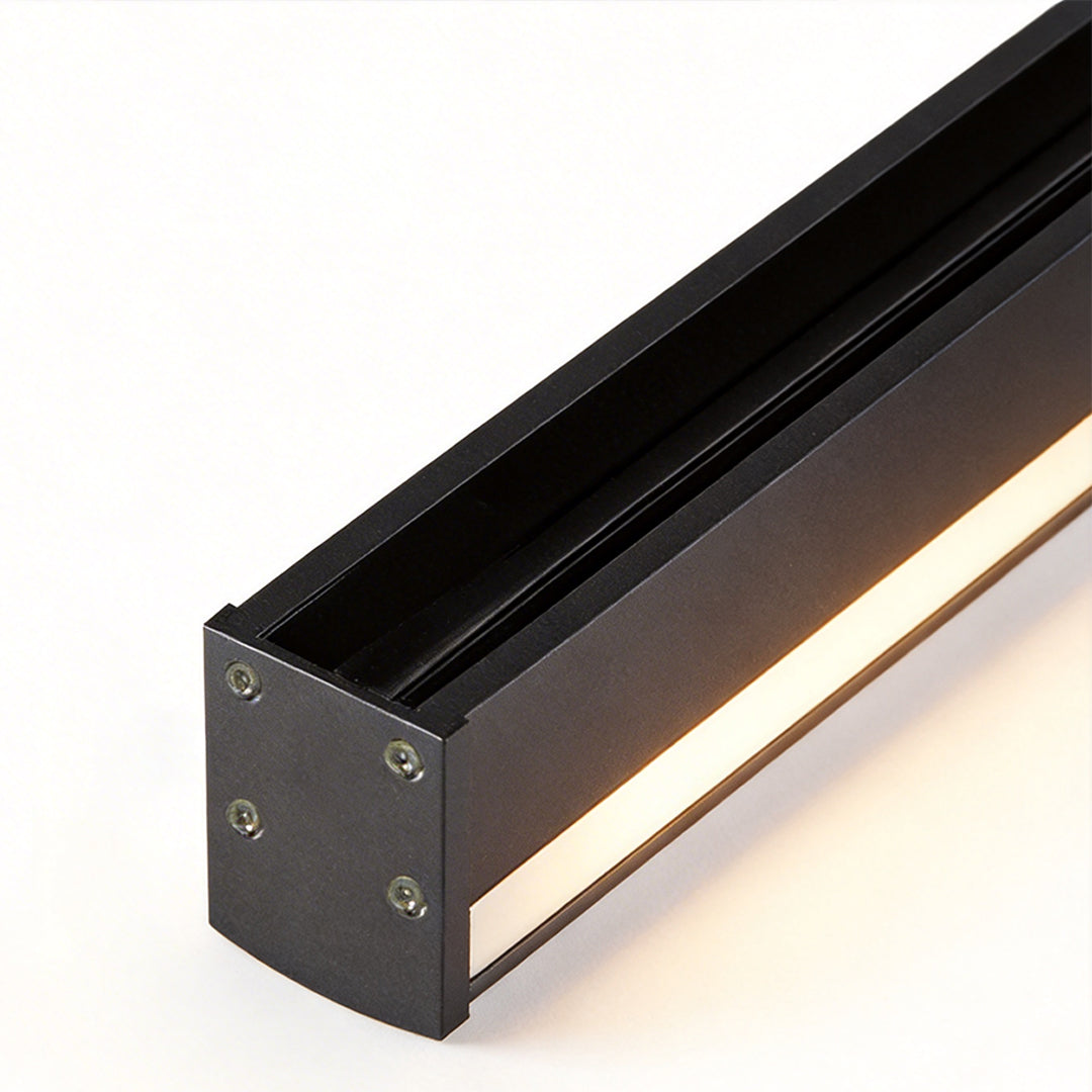 Outdoor linear wall light close-up revealing slim aluminum housing and internal LED strip.